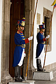 Quito Old Quarter, Presidential guards at main entrance, Palacio de Carondelet (1612). Quito. Ecuador. South America. 2007