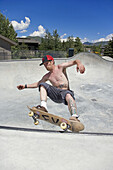 Man skateboarding, Sun Valley, Idaho, USA