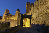 La Cité, Carcassonne medieval fortified town at dusk. Aude, Languedoc-Roussillon, France