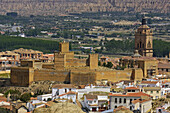Alcazaba and Cathedral view from Santiago troglodyte quarter, Guadix. Marquesado region, Granada province, Andalucia, Spain