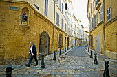 Old woman walking in Aix-En-Provence
