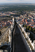 Up view of the west part of the Peñafiel castleand the Peñafiel town, Valladolid, Castilla Leon, Spain