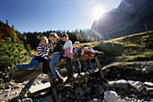 Children on a wooden bridge, Eng, Tyrol, Austria