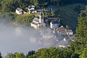 Bar Village, Bor-et-Bar, Aveyron, France. Bar village in valley with morning mist