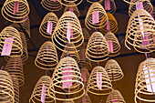 Hanging incense with prayer offerings hanging inside, Chinese Temple, Kuala Lumpur, Malaysia