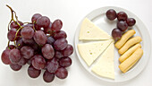 Piquets with cheese and grapes.