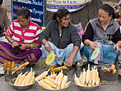 grilled corn for sale at the market in Darjeeling India