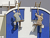 Painters are seating on cradles and working on a buildings exterior painting work  Pune, Maharashtra, India