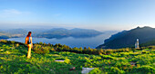 Woman looking at panorama of lake Maggiore, Monte Carza, Cannero, lake Maggiore, Lago Maggiore, Piemont, Italy
