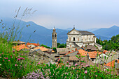 Spire and church above the roofs of Viggiona, Viggiona, Cannero, lake Maggiore, Lago Maggiore, Piemont, Italy