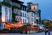 Restaurant on the illuminated seaside promenade in Ascona, Ascona, lake Maggiore, Lago Maggiore, Ticino, Switzerland