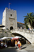 People at the city gate at the Old Town of Korcula, Korcula island, Croatian Adriatic Sea, Dalmatia, Croatia, Europe