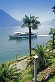 Excursion ship on the Lago di Lugano in the sunlight, Ticino, Switzerland, Europe