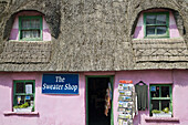 Thatched pink cottage house front, Ireland