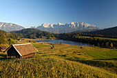 View over meadows and huts at lake Geroldsee, Bavaria, Germany, Europe