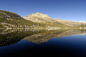 Lake Silvaplana with reflection of the mountains, Engadin, Grissons, Switzerland, Europe