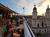 Terrace of Hotel Casa Granda, Catedral de Nuestra Senora de la Asuncion in background, Santiago de Cuba, Santiago de Cuba, Cuba, West Indies