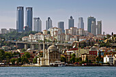 Ortakoy Mosque and Levent financial district skyline,  Istanbul,  Turkey