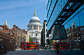 Saint pauls cathedral dome reflected in salvation army building godliman street, City of london  England  UK