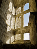 Window of the Column Hall in Quéribus ruined castle, Cathar castle. Aude, Languedoc-Roussillon, France