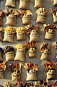 Bags of spices, corn and coffee on market stall, Chiang Mai, Northern Thailand