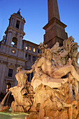 Fontana dei Quattro Fiumi at night in Piazza Navona, Rome, Lazio, Italy