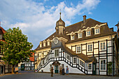 Town hall  (half-timbered house from 1804) and sculpture called Augenblicke by Christel Lechner, Rietberg, Kreis Gütersloh, Teutoburger Wald, Northrhine-Westphalia, Germany, Europe