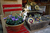 Flowers and ceramics in front of a souvenir shop at Roussillon, Vaucluse, Provence, France, Europe