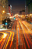 Traffic trails at night on Howard Street, San Francisco, California, USA