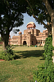 View of the Laxmi Niwas Palace framed by trees, Bikaner, Rajasthan, India