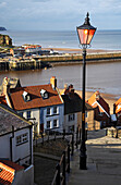 View over town and sea from Church Stairs, Whitby, Yorkshire, UK, England