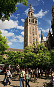 The Giralda tower and tourists, Seville, Andalucia, Spain