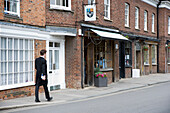 Eton scholar in High Street, Eton, Berkshire, UK, England