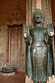 Bronze Buddha statue at Haw Pha Kaew, Vientiane, Laos