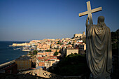 View from statue with cross over town with harbour and castle, Gaeta, Lazio, Italy