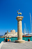 Mandraki Harbour with bronze deer statue, Rhodes Town, Rhodes Island, Greek Islands