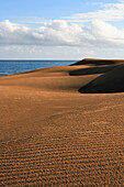 View over sand dunes to sea, Maspalomas, Gran Canaria, Canary Islands