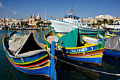 Harbour with traditional Luzzu fishing boats, Marsaxlokk, Malta, Maltese Islands