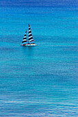 Yacht sailing on calm sea, Oahu Island, Hawaii, USA