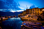 Harbour scene at night, Malcesine, Lombardy, Lake Garda, Italy
