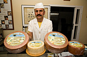Julian Diaz showing goat cheese at a cheese dairy, Tiscamanita, Fuerteventura, Canary Islands, Spain, Europe