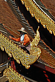 Workers replacing roof tiles, Wat Chedi Luang, Chiang Mai, Thailand, Asia