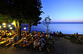 Guests in a beer garden at lakefront promenade, Herrsching am Ammersee, Bavaria, Germany