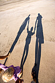 View at the shadow of a family in the sand, Punta Conejo, Baja California Sur, Mexico, America