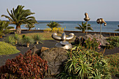 Sculptures along the beach promenade, Playa de las Cucharadas, Costa Teguise, Lanzarote, Canary Islands, Spain, Europe