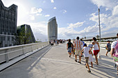 Pedestrian bridge and Water Tower by architect Enrique de Teresa in backrgound,  Expo Zaragoza 2008. Zaragoza,  Aragon,  Spain