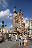 Great Market Square or Main Square, Basilica of the Virgin Mary’s, 14th century,  Gothic Cathedral, Cracow,  Krakow, Poland