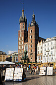 Great Market Square or Main Square, Basilica of the Virgin Mary’s, 14th century,  Gothic Cathedral, Cracow,  Krakow, Poland
