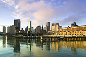 Australia - New South Wales (NSW) - Sydney: City Skyline and The Rocks historic area at sunrise