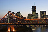 AUSTRALIA - Queensland - Brisbane: Evening view of the Story Bridge with Riverside Centre Highrises